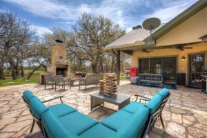 The backyard of a Fredericksburg, Texas, vacation rental to relax in while sipping on a beer from a local brewery.