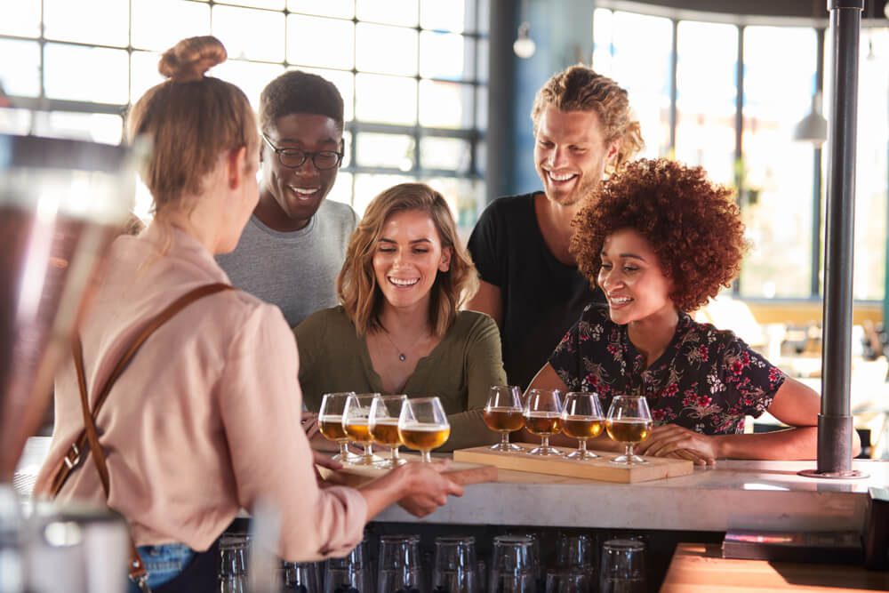 A group of people at a Fredericksburg, Texas, brewery