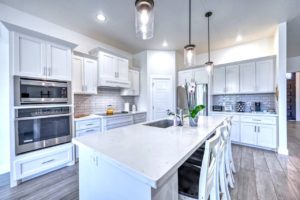 The kitchen of a vacation rental in Fredericksburg, TX, to enjoy take out from one of the German restaurants in town.