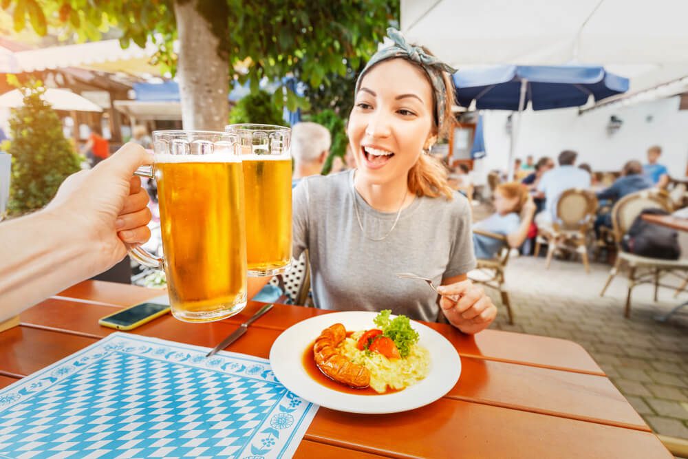 A photo of people eating at one of the German restaurants in Fredericksburg, TX.